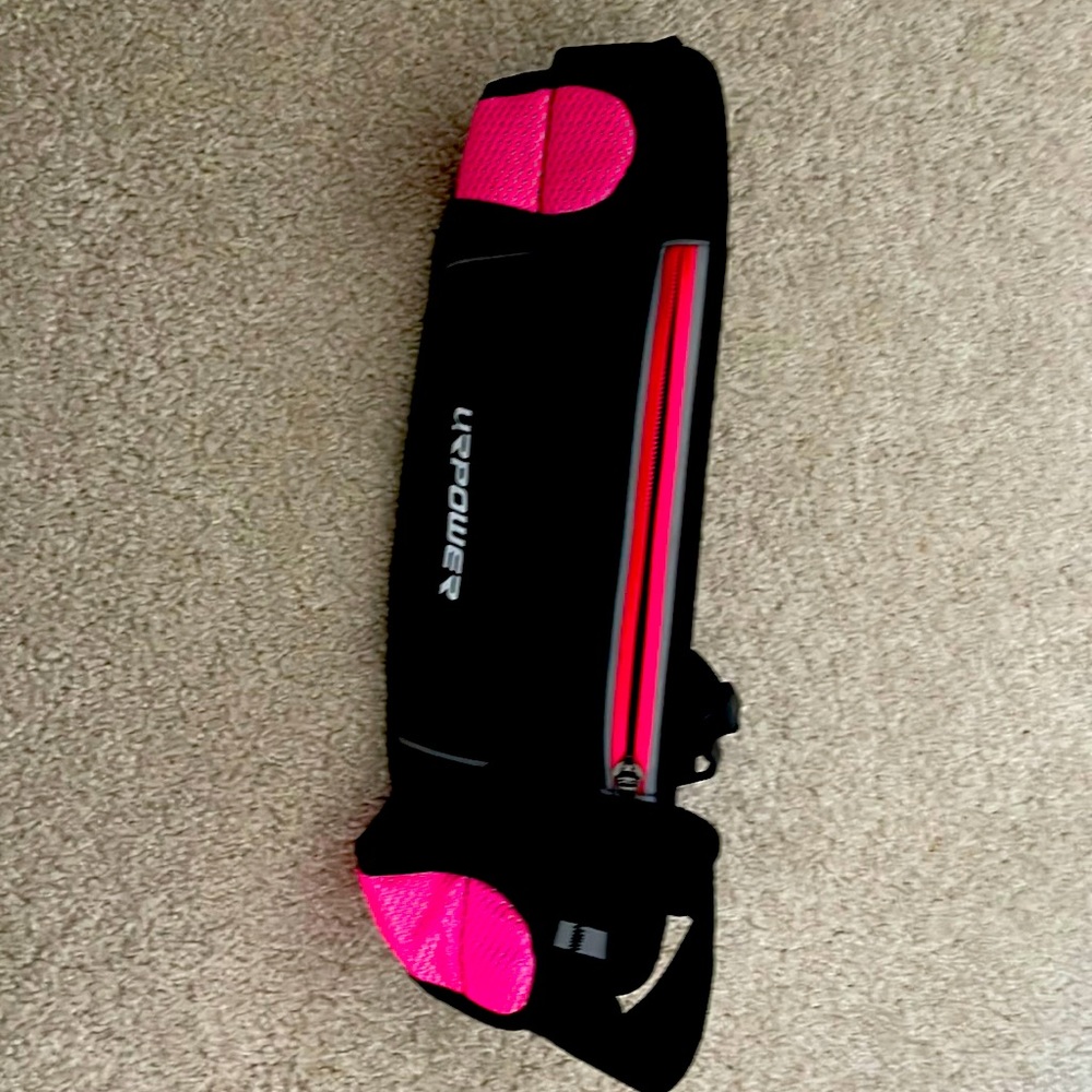 Black waist belt with inserts for water bottle